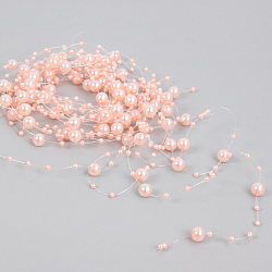 Праздничное украшение "Бусы на леске" персиковые
